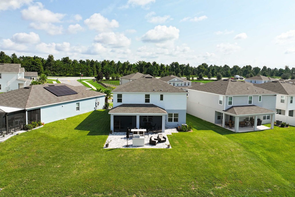 Aerial view of the home on its elevated premium lot
