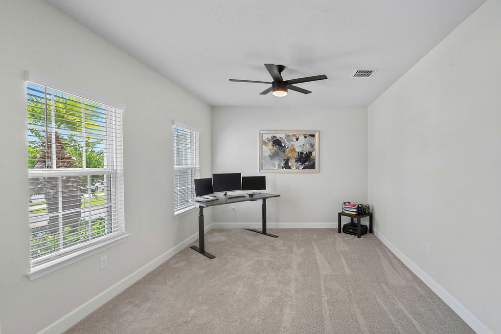 Bright front flex room, adaptable as office or formal living/dining