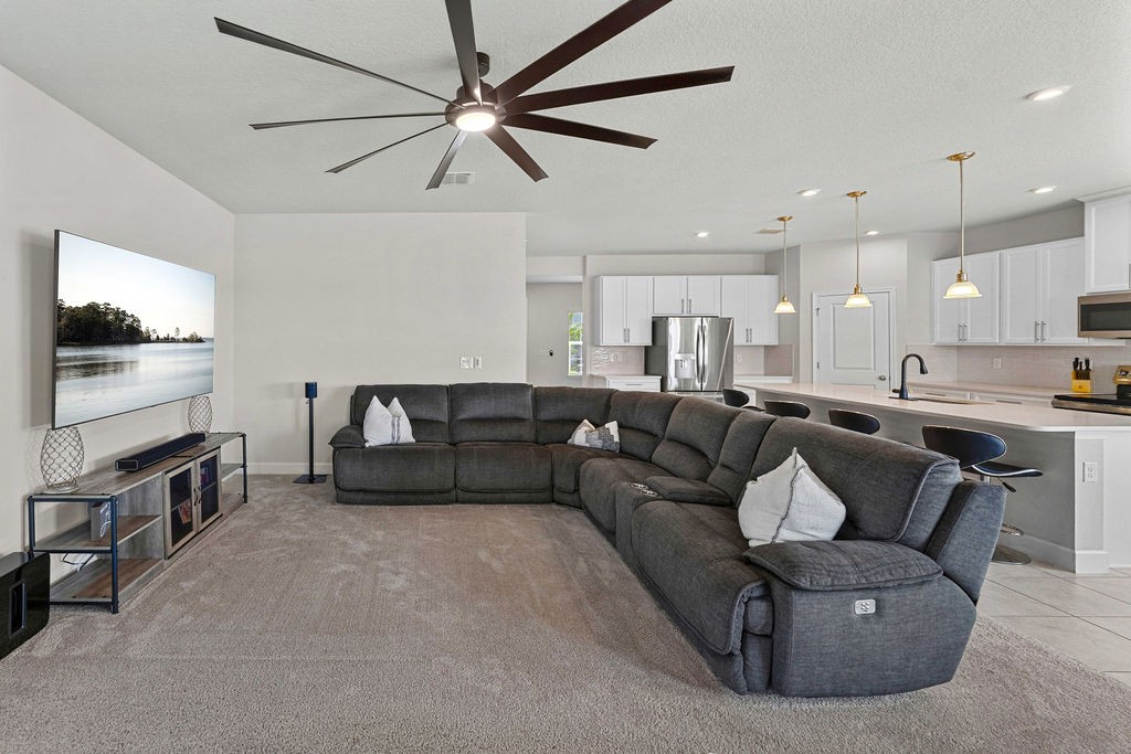 Open great room drenched in natural light