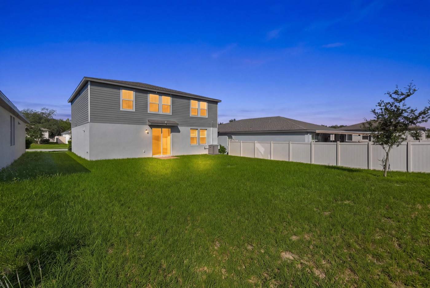 Back of the home at twilight